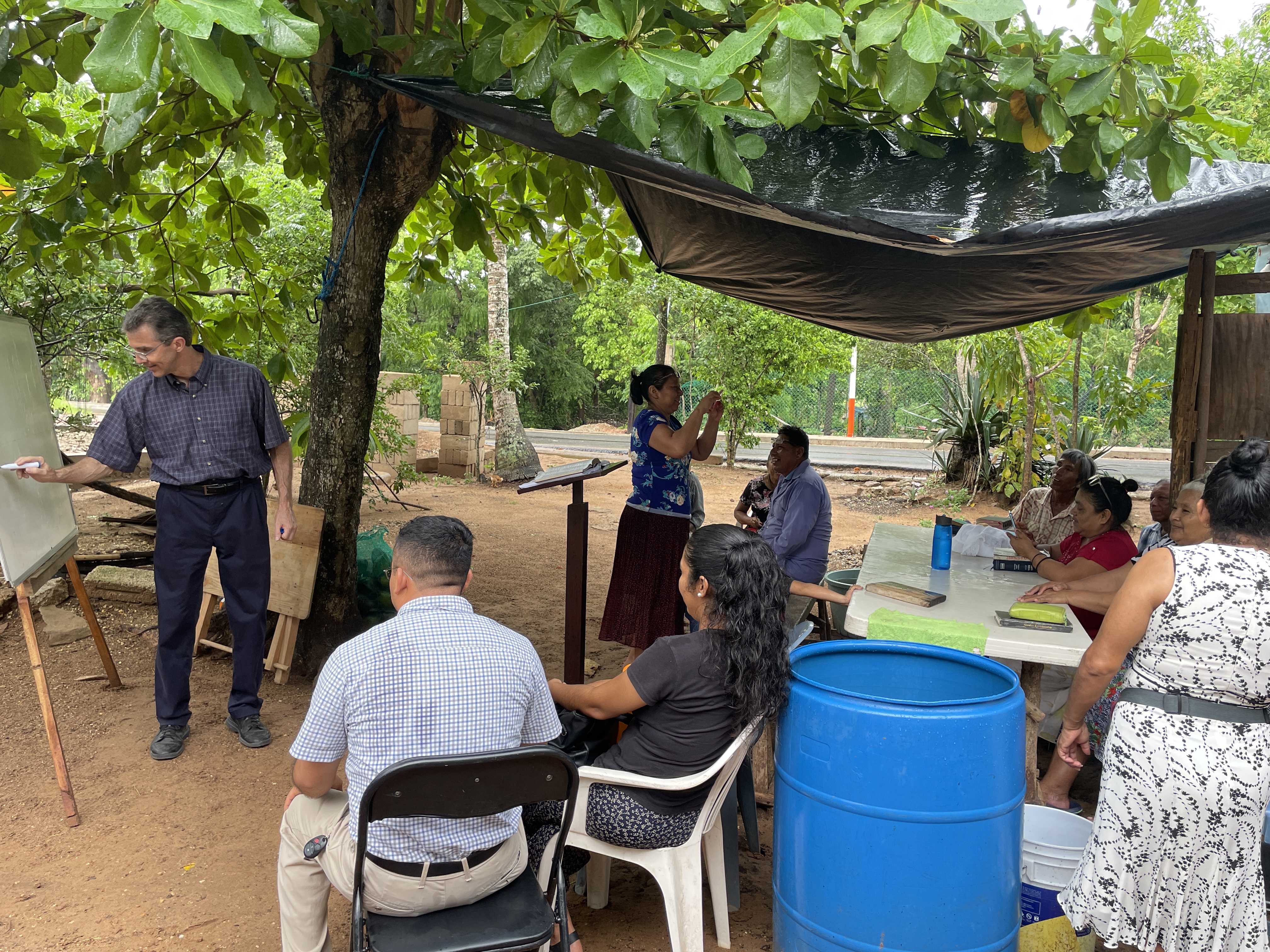 Church meeting at a Christian's house, outdoors